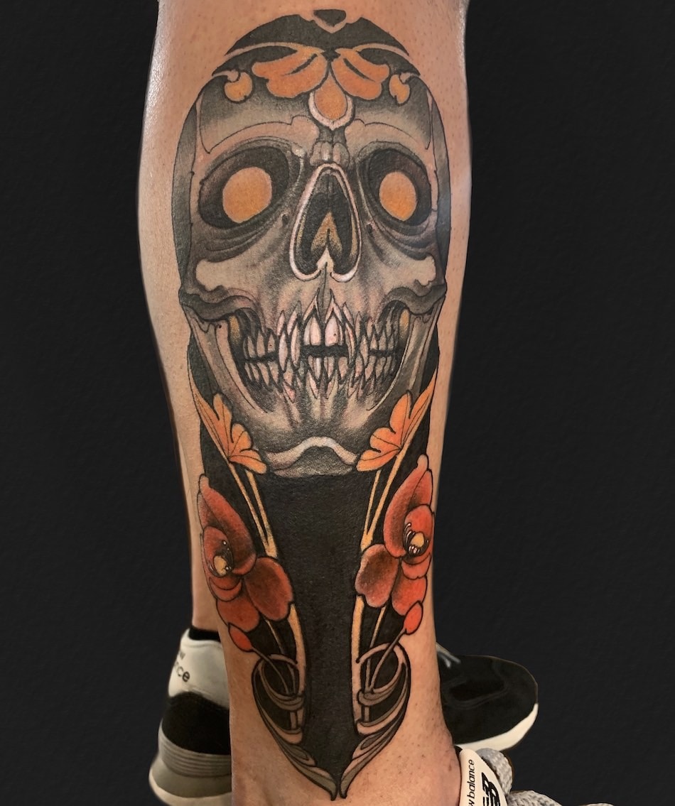 SKULL AND FLOWERS ART NOUVEAU TATTOO ON THE LEG